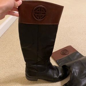 Black and brown high boots